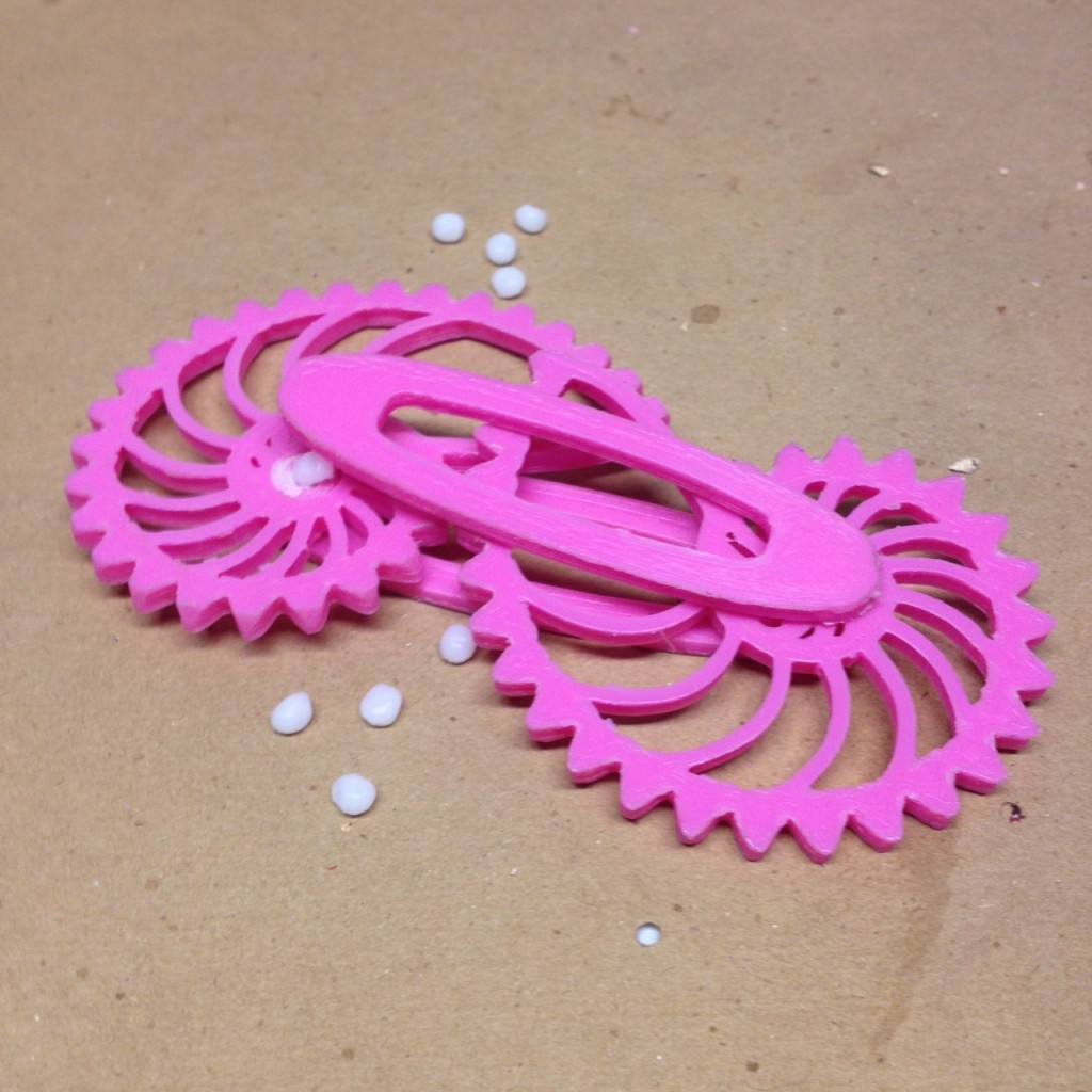Elliptical PLA gears, with a single bead of PCL to glue the shafts together.